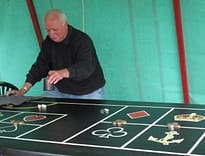 man playing cardboard cutouts